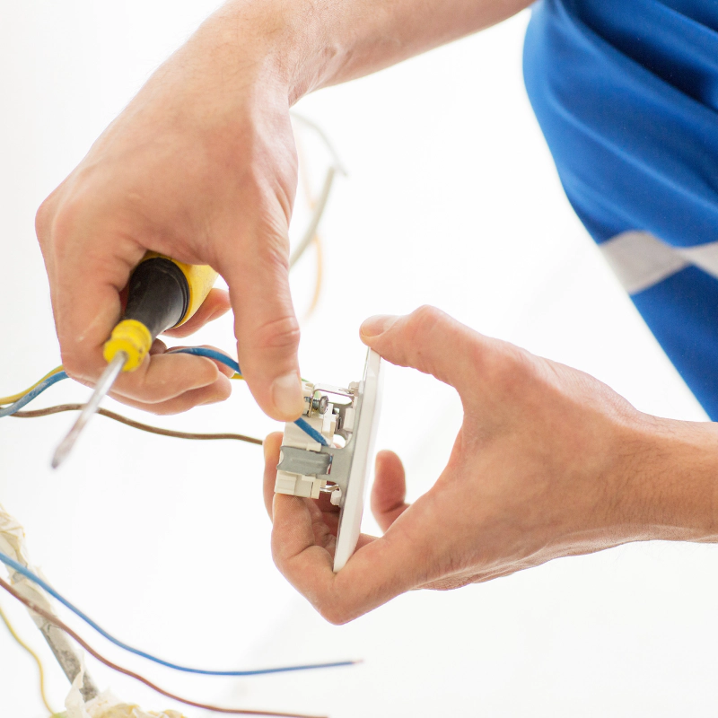 technician connecting wires